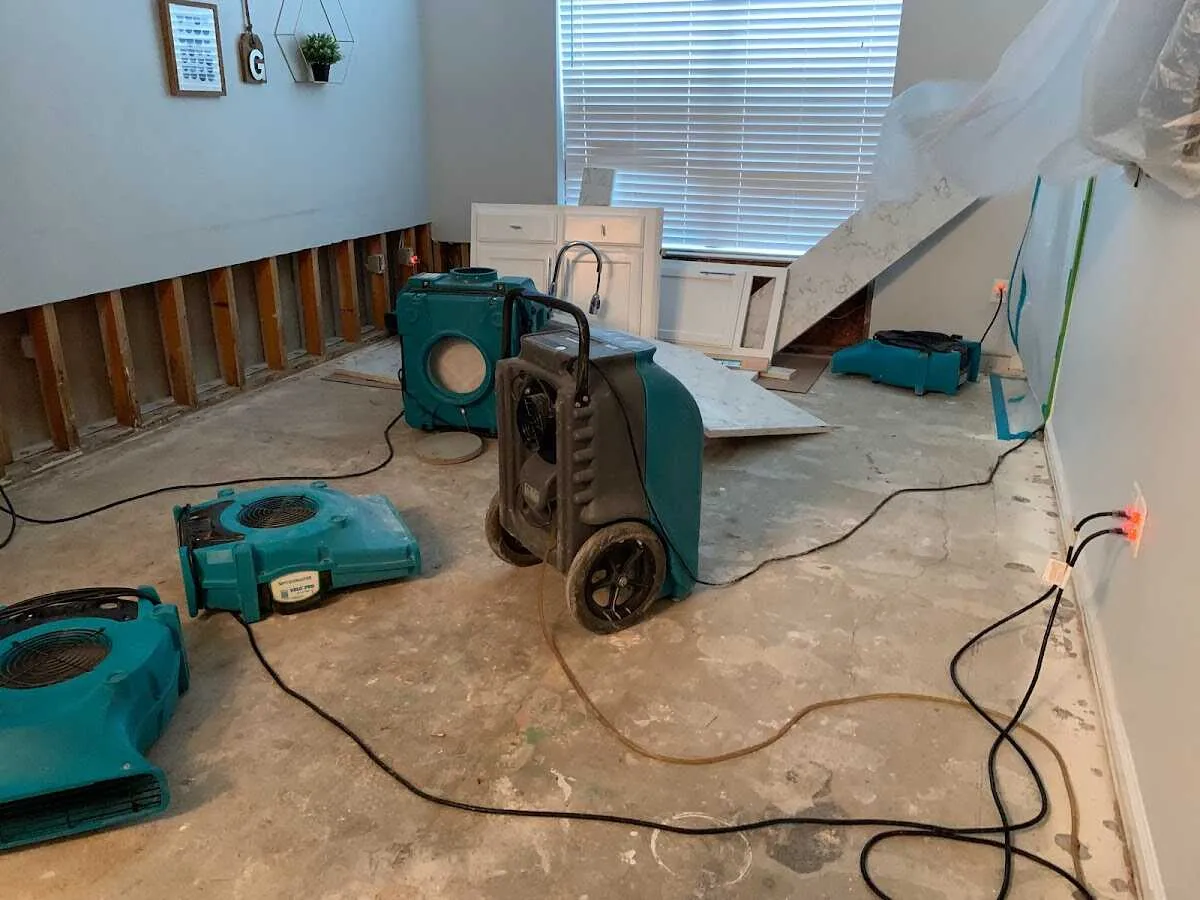 Dehumidifier in flood-cut room for Water Damage Restoration in Pelham