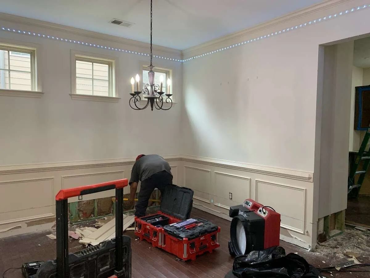 Restoration technician with professional equipment in Pelham